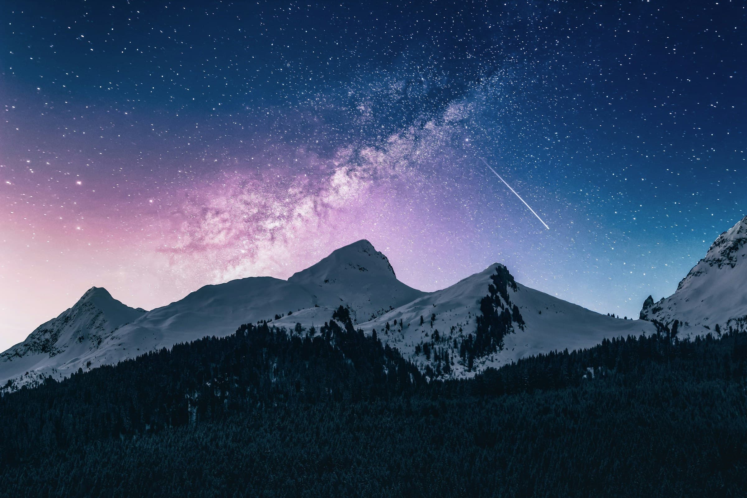 A starry mountain landscape representing the climb from innovation to trusted scale